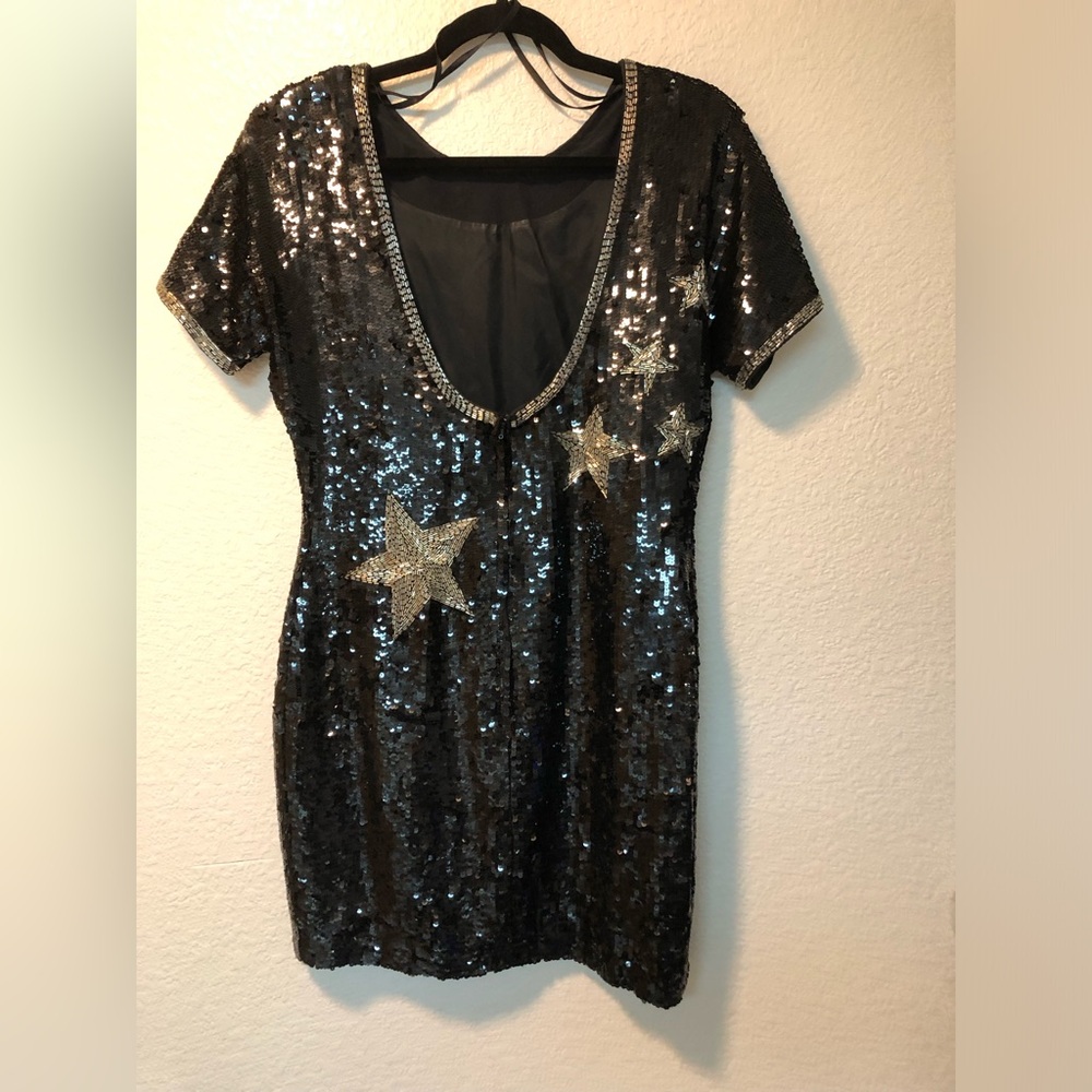 Magali Cocktail Mini Dress. Black and Silver Sequined Stars. 100% Silk. Size 8.